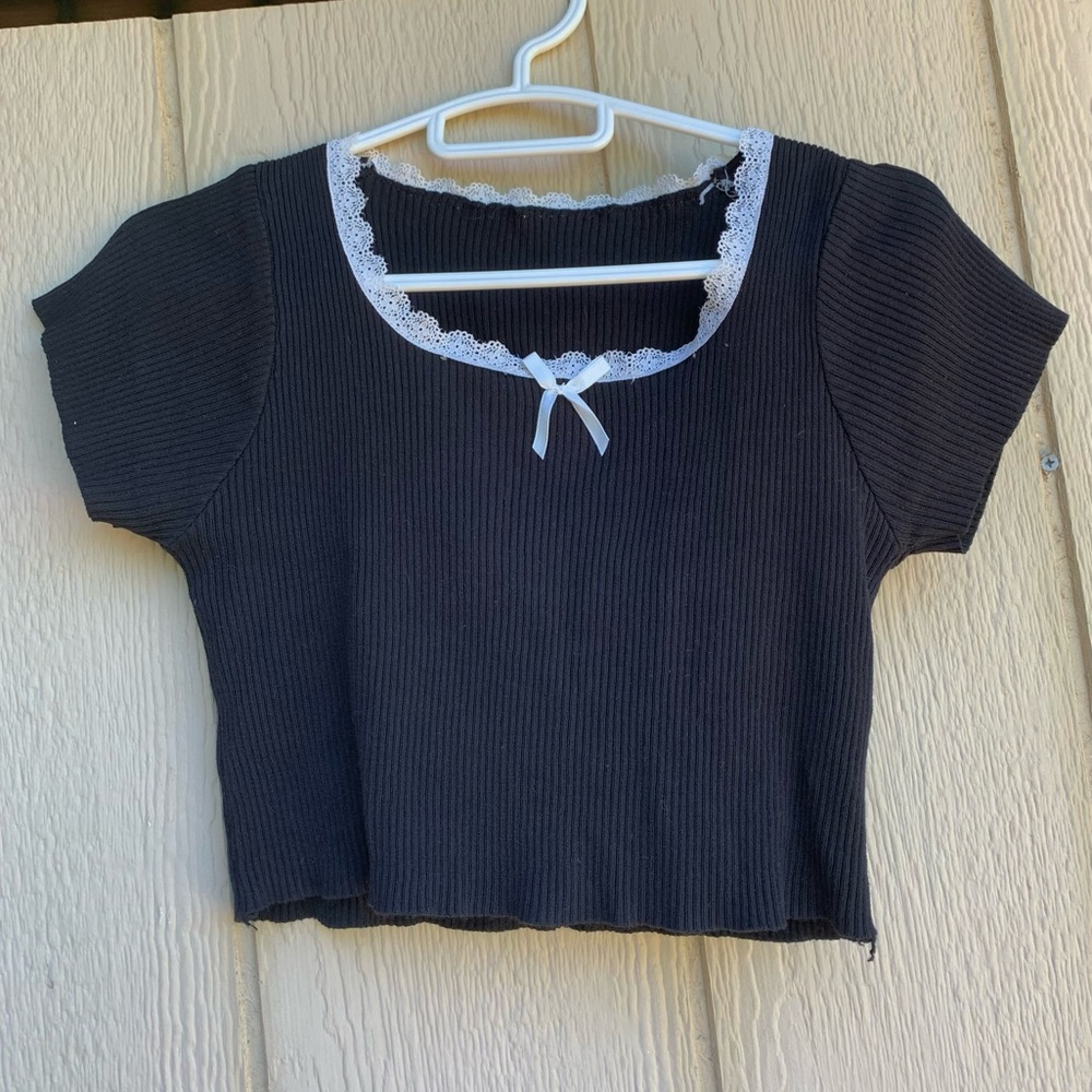 Black crop top with white lace trim and bow